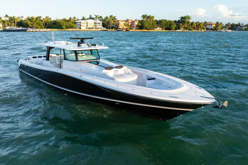  Yacht Photos Pics 2021 HCB 65 Estrella luxury boat cruising on a scenic waterway.