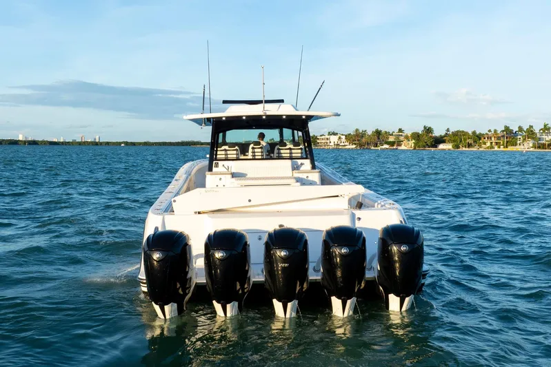  Yacht Photos Pics 2021 HCB 65 Estrella boat with five engines on open water.