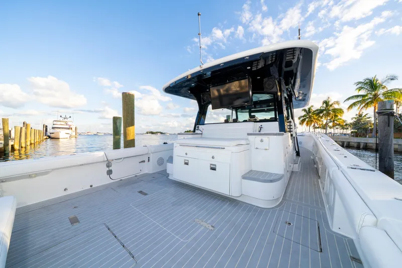  Yacht Photos Pics 2021 HCB 65 Estrella boat docked, featuring spacious deck and modern amenities.