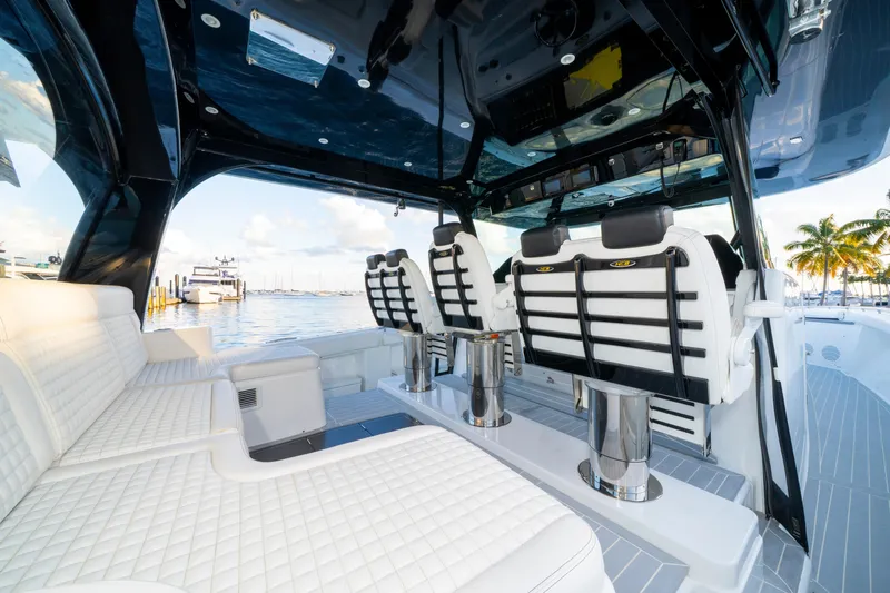  Yacht Photos Pics Luxurious interior of 2021 HCB 65 Estrella boat with plush seating and sleek design.