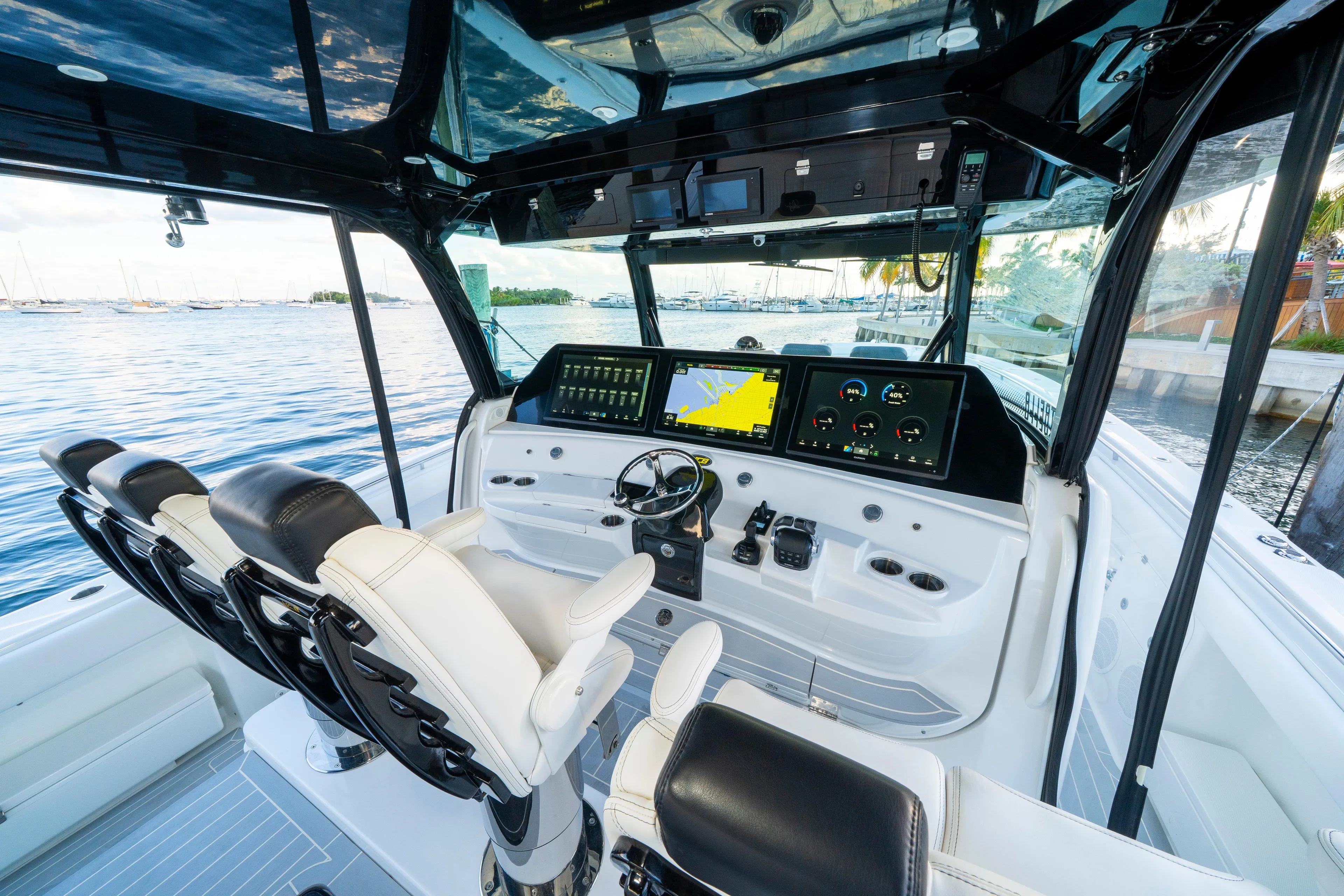  Yacht Photos Pics 2021 HCB 65 Estrella boat cockpit with advanced navigation displays and luxurious seating.