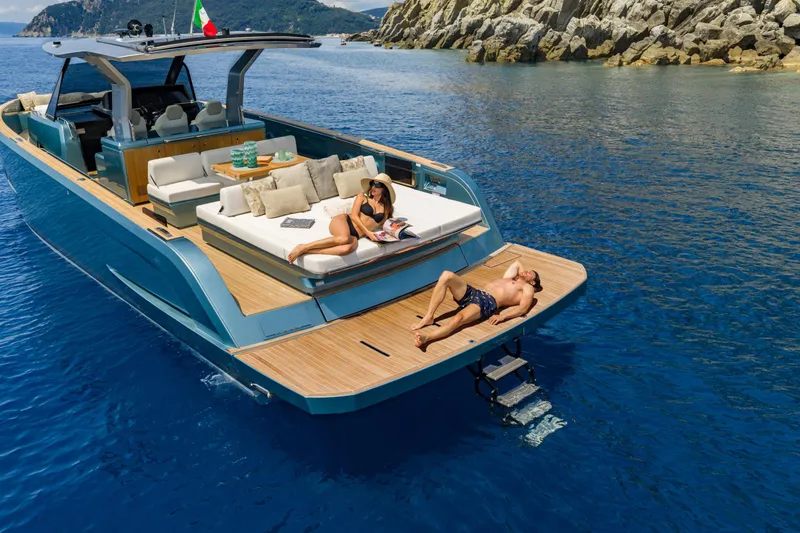 Pardo 43 Yacht Photos Pics Luxury Pardo Yachts 43, 2026 model, cruising with sunbathers on deck in scenic waters.