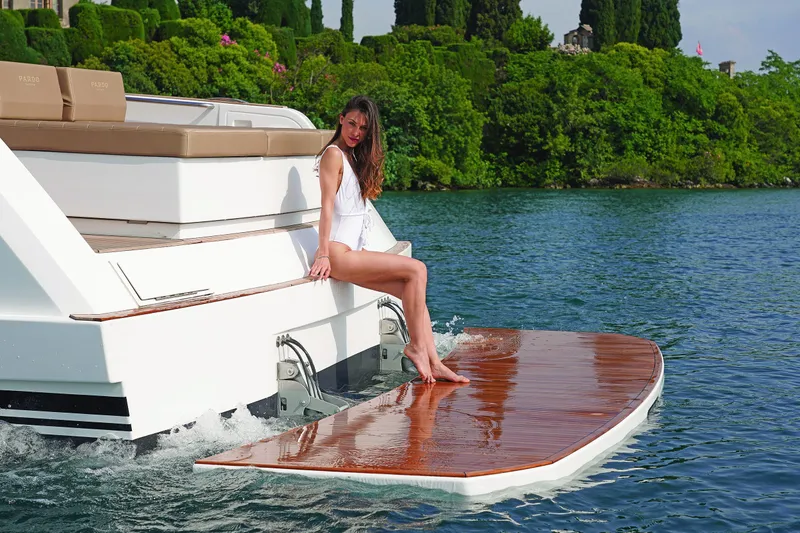 Pardo 43 Yacht Photos Pics Woman relaxing on 2026 Pardo Yachts 43, enjoying the water and sun.