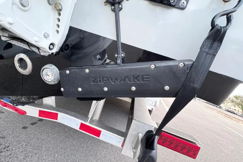  Yacht Photos Pics 2024 Sea Pro 292 DLX boat with Zipwake system on trailer.