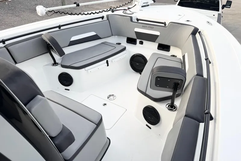  Yacht Photos Pics 2024 Sea Pro 292 DLX boat interior with gray seating and modern design.