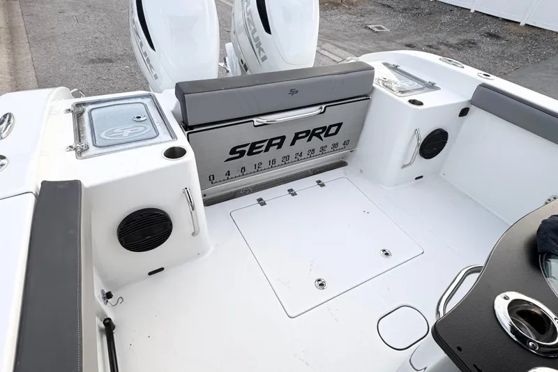  Yacht Photos Pics 2024 Sea Pro 292 DLX boat interior with dual Suzuki engines and spacious deck layout.