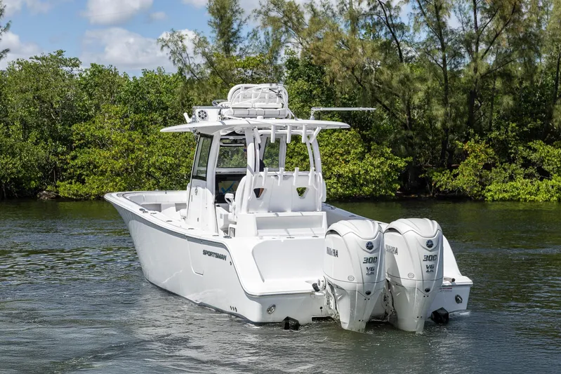  Yacht Photos Pics 2024 Sportsman Open 322 Center Console boat with dual Yamaha engines on water.