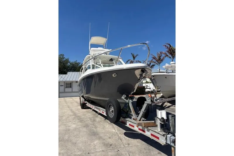  Yacht Photos Pics 2008 Everglades 350LX boat on trailer under clear blue sky.
