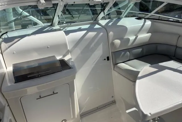  Yacht Photos Pics 2008 Everglades 350LX boat interior with seating and kitchenette area.