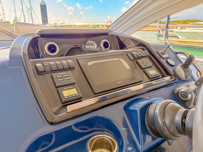  Yacht Photos Pics Control panel of 2021 Beneteau Gran Turismo 41 yacht, featuring navigation and control systems.