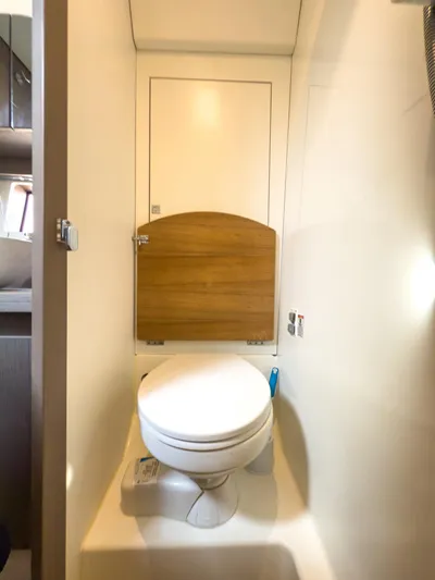  Yacht Photos Pics 2021 Beneteau Gran Turismo 41 yacht bathroom with modern toilet design.