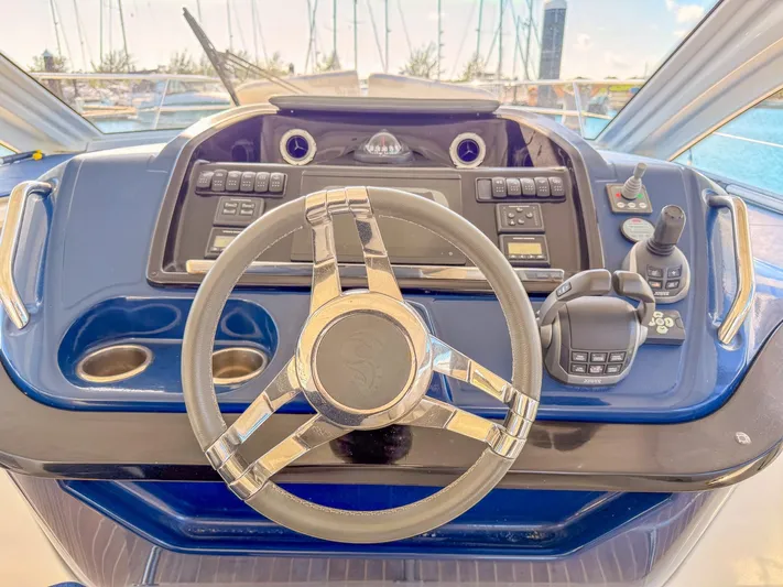  Yacht Photos Pics Steering wheel and dashboard of 2021 Beneteau Gran Turismo 41 yacht.