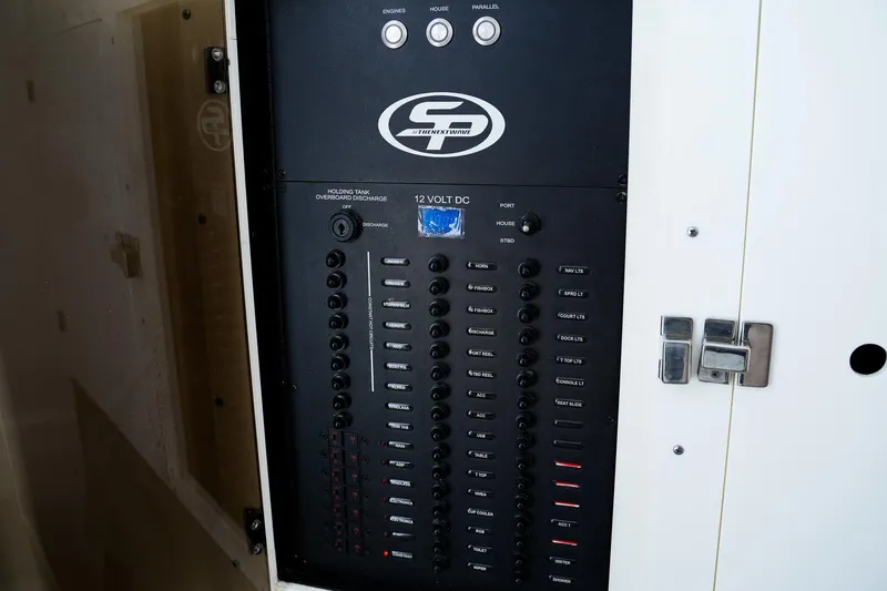  Yacht Photos Pics Electrical panel of 2022 Sea Pro 320 DLX Offshore boat, featuring various switches and controls.
