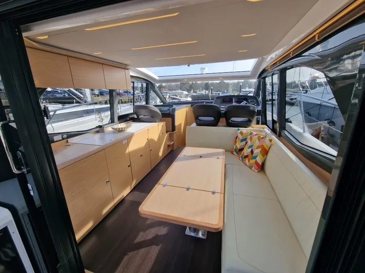 324000084-r40 Yacht Photos Pics Luxurious interior of 2025 Bavaria R40 yacht with modern seating and stylish decor.