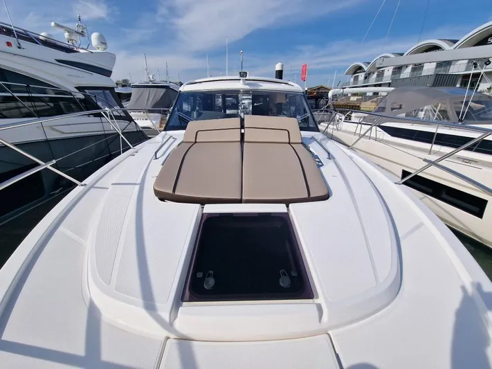 324000084-r40 Yacht Photos Pics Luxury Bavaria R40 yacht, 2025 model, docked at marina under clear blue sky.