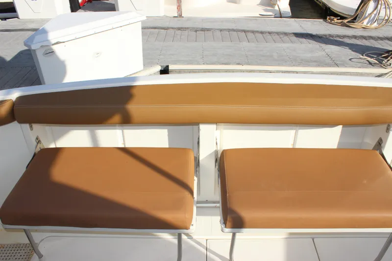  Yacht Photos Pics Brown cushioned seating on 2002 Regal Commodore 3880 boat deck.