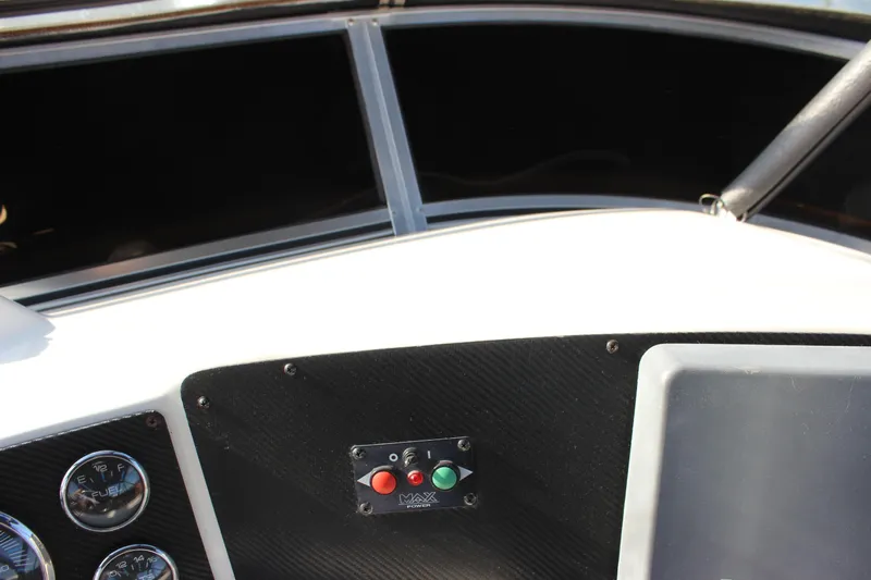  Yacht Photos Pics Dashboard of a 2002 Regal Commodore 3880 boat with gauges and control panel.