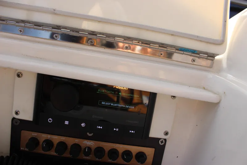  Yacht Photos Pics Control panel of a 2002 Regal Commodore 3880 boat with Bluetooth audio system.