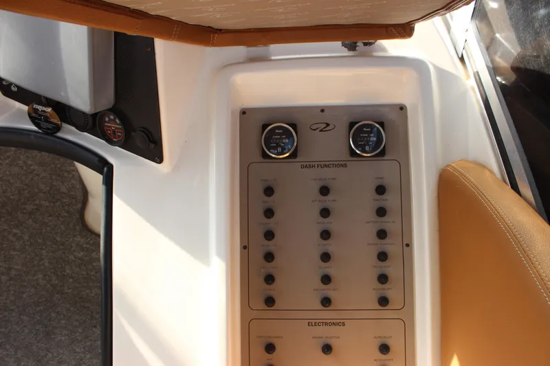  Yacht Photos Pics Control panel of 2002 Regal Commodore 3880 boat with various dash functions.