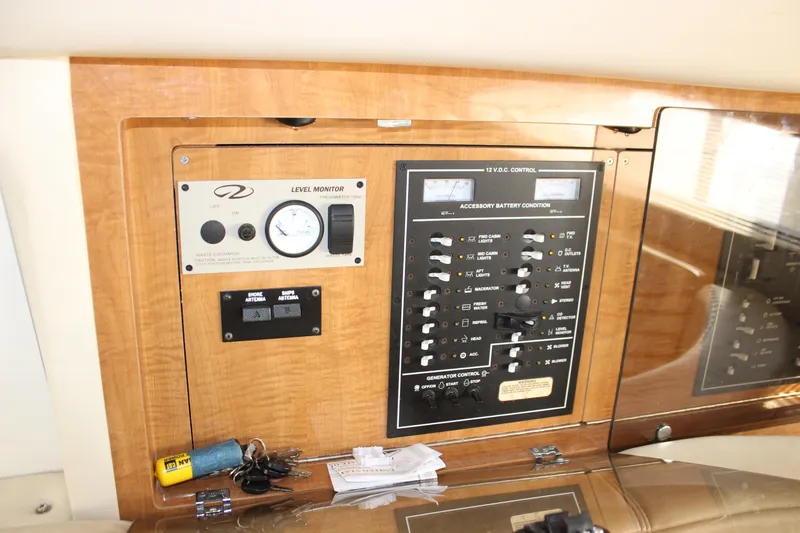  Yacht Photos Pics Control panel of 2002 Regal Commodore 3880 boat with switches and gauges.