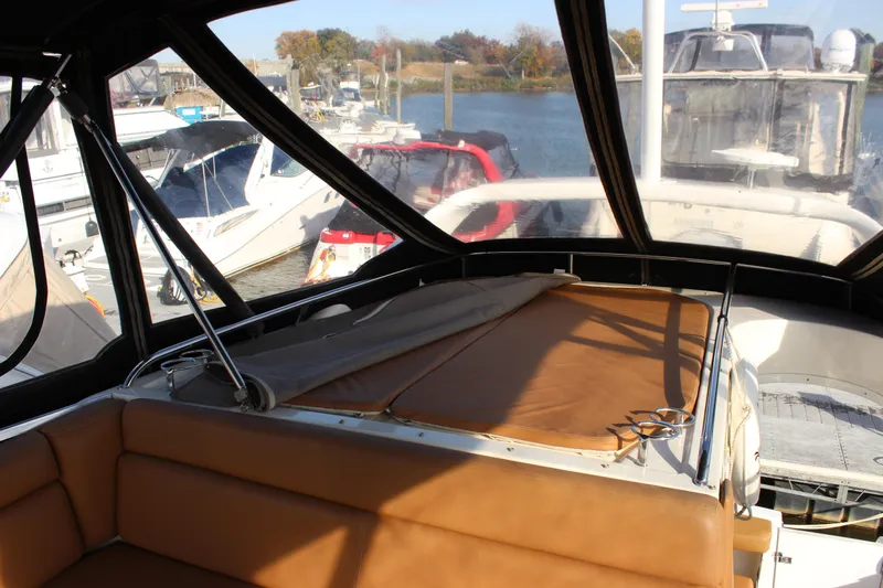 Yacht Photos Pics Interior view of a 2002 Regal Commodore 3880 yacht at a marina.