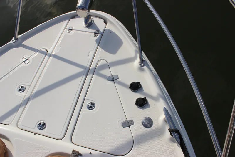  Yacht Photos Pics Bow deck of 2002 Regal Commodore 3880 boat with railings and hatches.