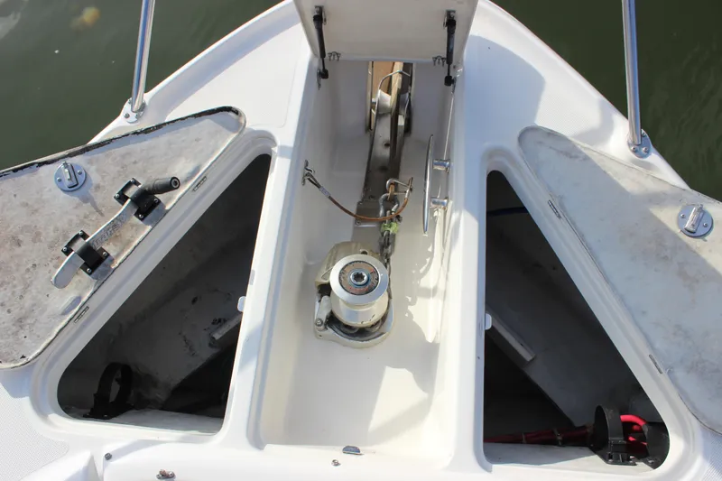  Yacht Photos Pics Anchor compartment of 2002 Regal Commodore 3880 boat, showing storage and winch system.