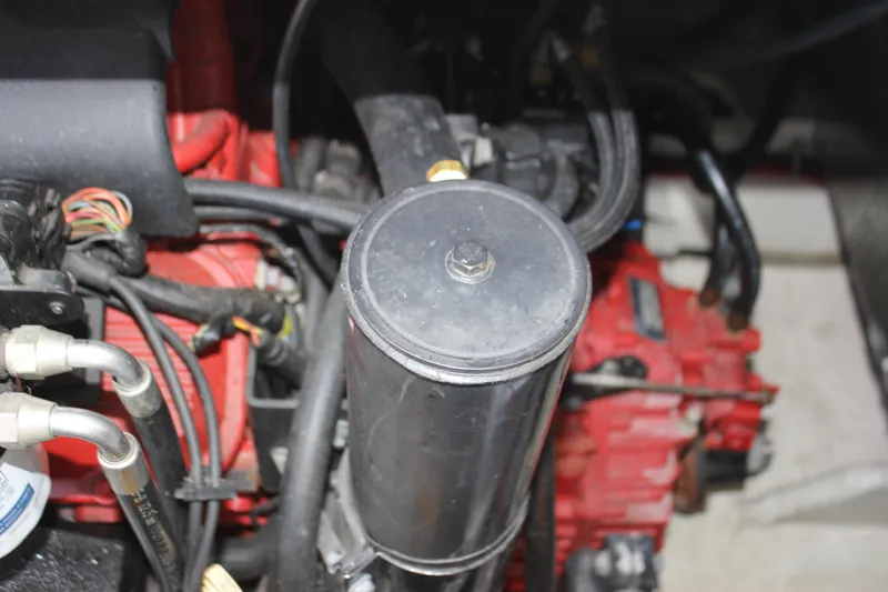  Yacht Photos Pics Engine components of a 2002 Regal Commodore 3880 boat, featuring hoses and wiring.