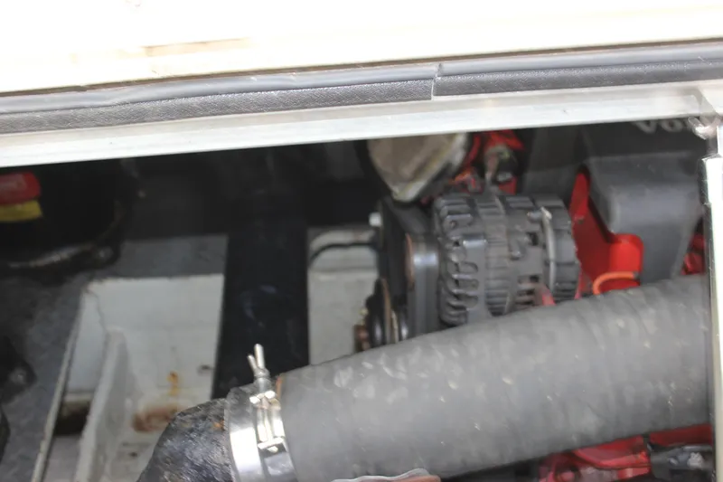  Yacht Photos Pics Engine compartment of a 2002 Regal Commodore 3880 boat, featuring visible components.