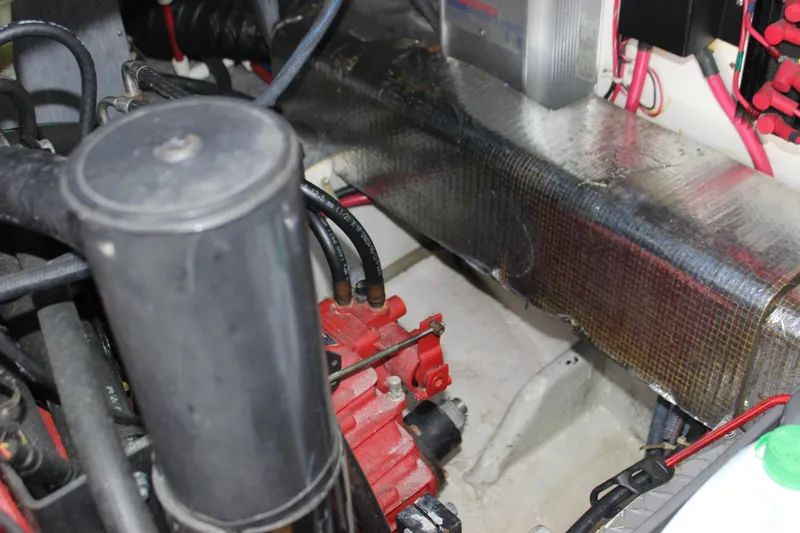  Yacht Photos Pics Engine compartment of a 2002 Regal Commodore 3880 boat, showing various components and wiring.