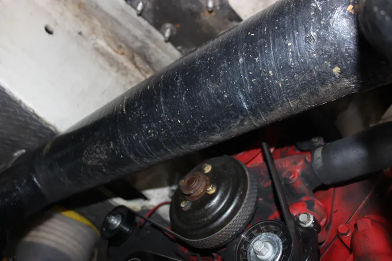  Yacht Photos Pics Engine components of a 2002 Regal Commodore 3880, featuring hoses and pulleys.