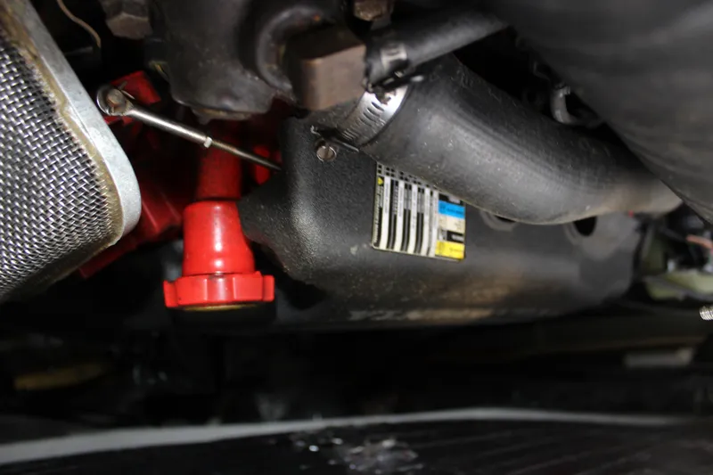  Yacht Photos Pics Close-up of 2002 Regal Commodore 3880 engine components, featuring hoses and labels.