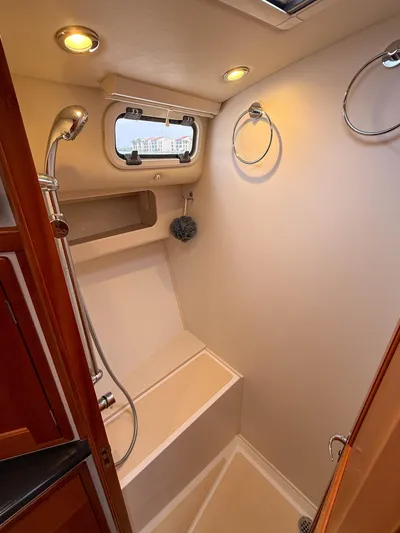 Noble Grace Yacht Photos Pics 2019 MJM 43z yacht shower with modern fixtures and natural lighting.