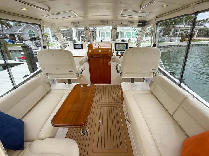 Noble Grace Yacht Photos Pics Luxurious 2019 MJM 43z yacht interior with plush seating and elegant wood finishes.