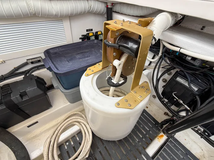 Noble Grace Yacht Photos Pics Engine compartment of 2019 MJM 43z boat with mechanical components and storage.
