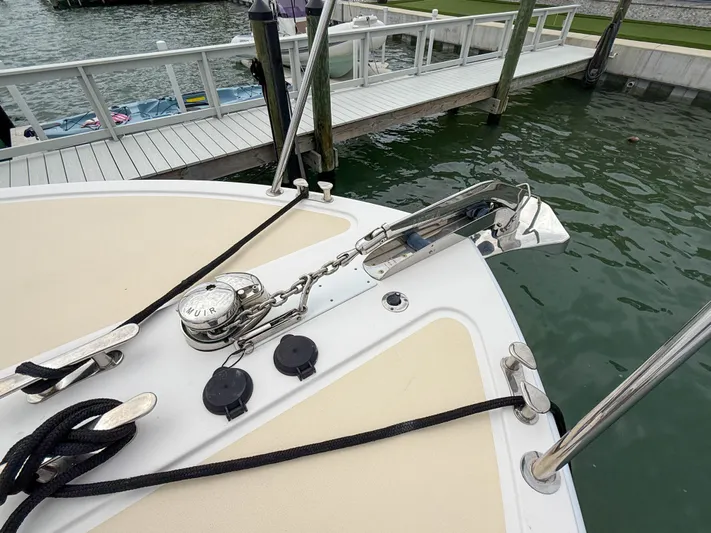 Noble Grace Yacht Photos Pics Bow of 2019 MJM 43z yacht with anchor and mooring lines at dock.