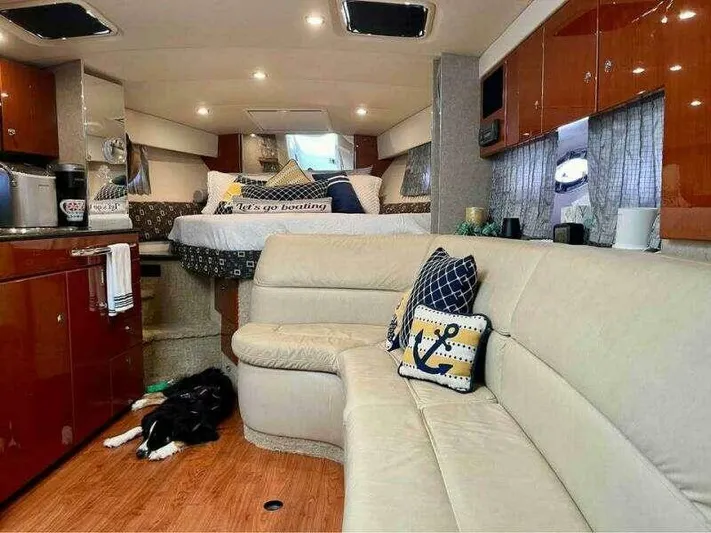 Attitude Is Everything Yacht Photos Pics Luxurious 2007 Formula 31 PC yacht interior with cozy seating and nautical decor.