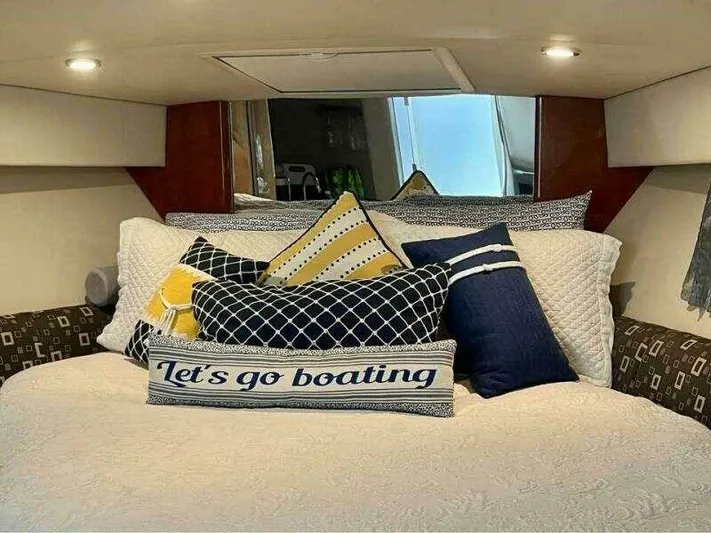 Attitude Is Everything Yacht Photos Pics Cozy cabin interior of 2007 Formula 31 PC boat with decorative pillows.