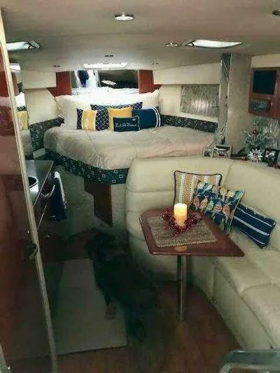 Attitude Is Everything Yacht Photos Pics Interior of a 2007 Formula 31 PC yacht with cozy seating and a bed.