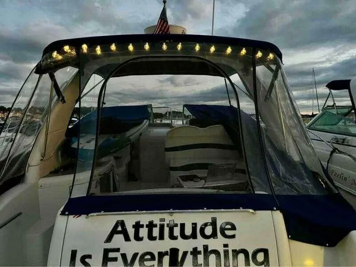 Attitude Is Everything Yacht Photos Pics 2007 Formula 31 PC boat with "Attitude Is Everything" text, docked at marina.