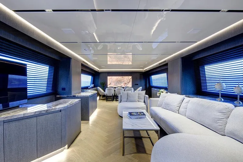  Yacht Photos Pics Luxurious interior of 1988 Heesen 32 yacht with modern furnishings and elegant decor.