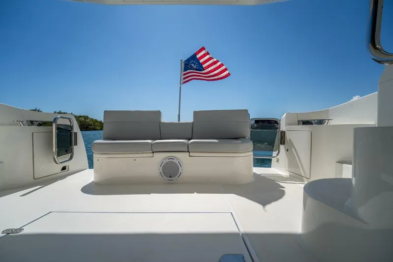  Yacht Photos Pics Azimut 46 yacht interior with American flag, 2001 model, sunny day.