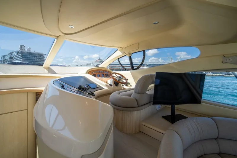  Yacht Photos Pics Interior of 2001 Azimut 46 yacht, featuring modern helm and luxurious seating.