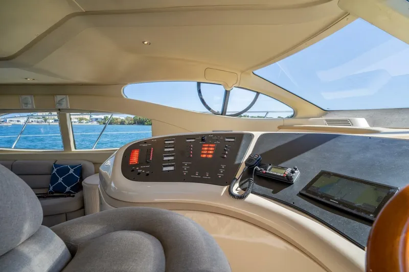  Yacht Photos Pics Interior view of 2001 Azimut 46 yacht cockpit with navigation controls and seating.