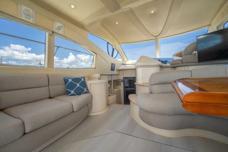  Yacht Photos Pics Luxurious interior of a 2001 Azimut 46 yacht with elegant seating and panoramic windows.