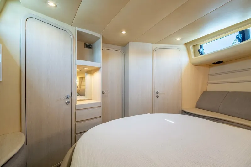  Yacht Photos Pics Luxurious interior of 2001 Azimut 46 yacht cabin with modern furnishings.