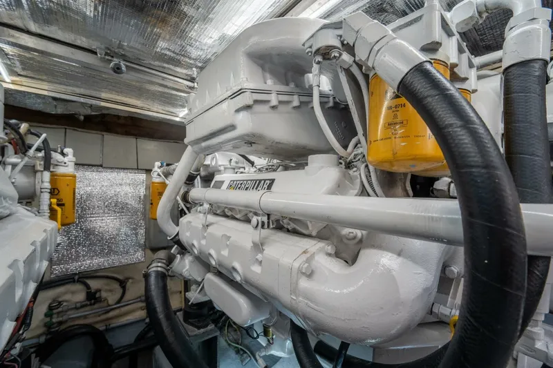  Yacht Photos Pics Engine room of a 2001 Azimut 46 yacht, featuring Caterpillar machinery and components.