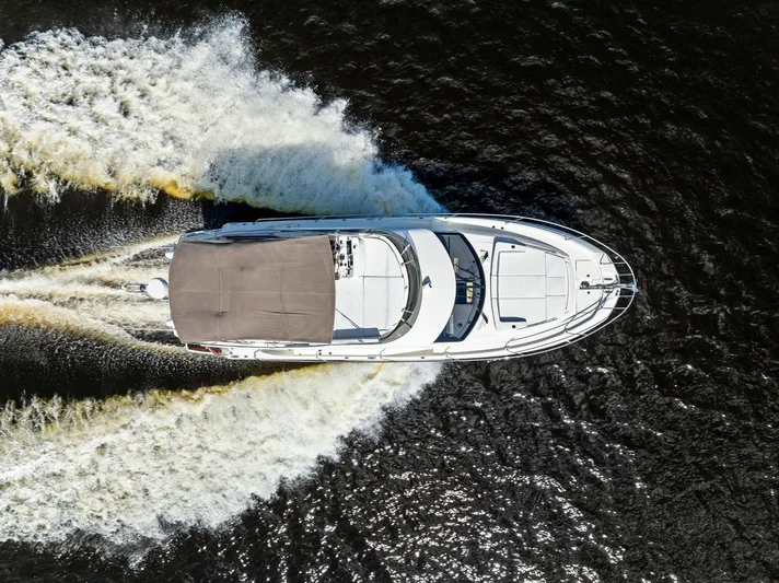  Yacht Photos Pics Aerial view of 2018 Prestige 460 yacht cruising on water.