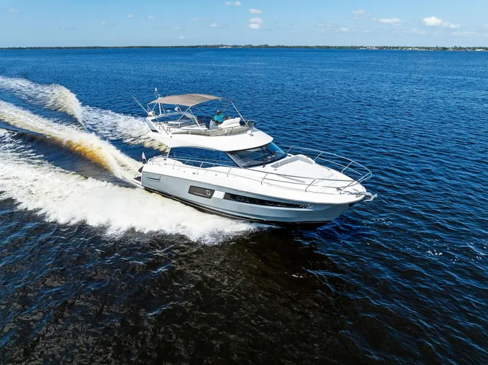  Yacht Photos Pics 2018 Prestige 460 yacht cruising on open water.