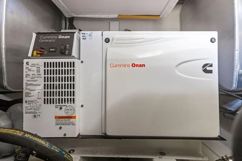  Yacht Photos Pics Cummins Onan generator in a 2018 Prestige 460 yacht engine room.